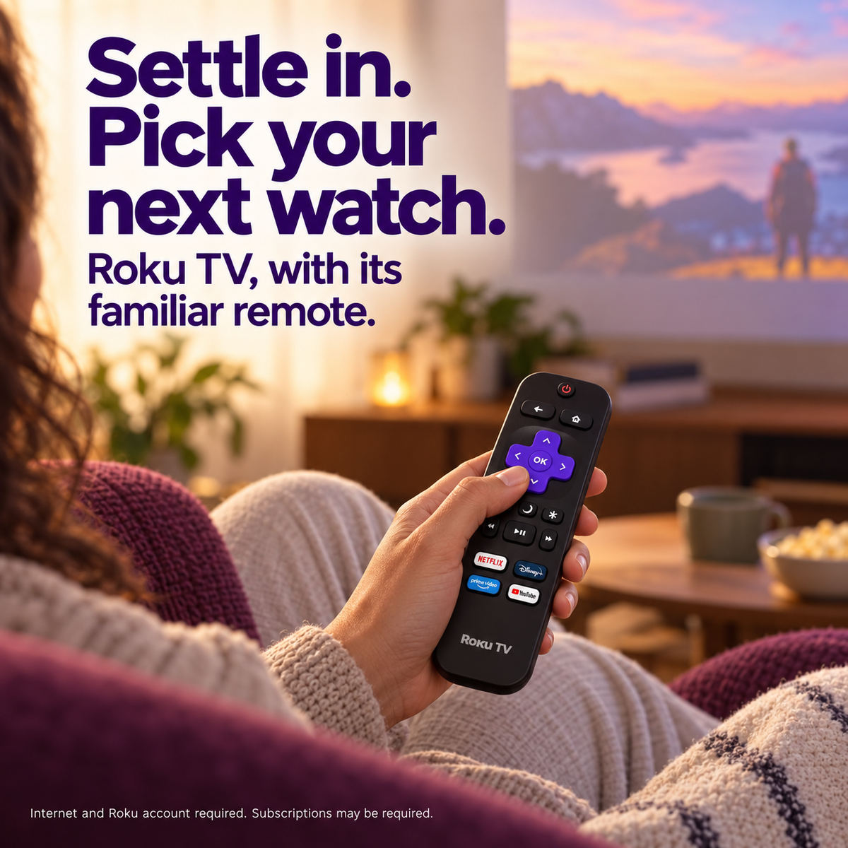 An adult uses the included black Roku TV remote with purple directional buttons.