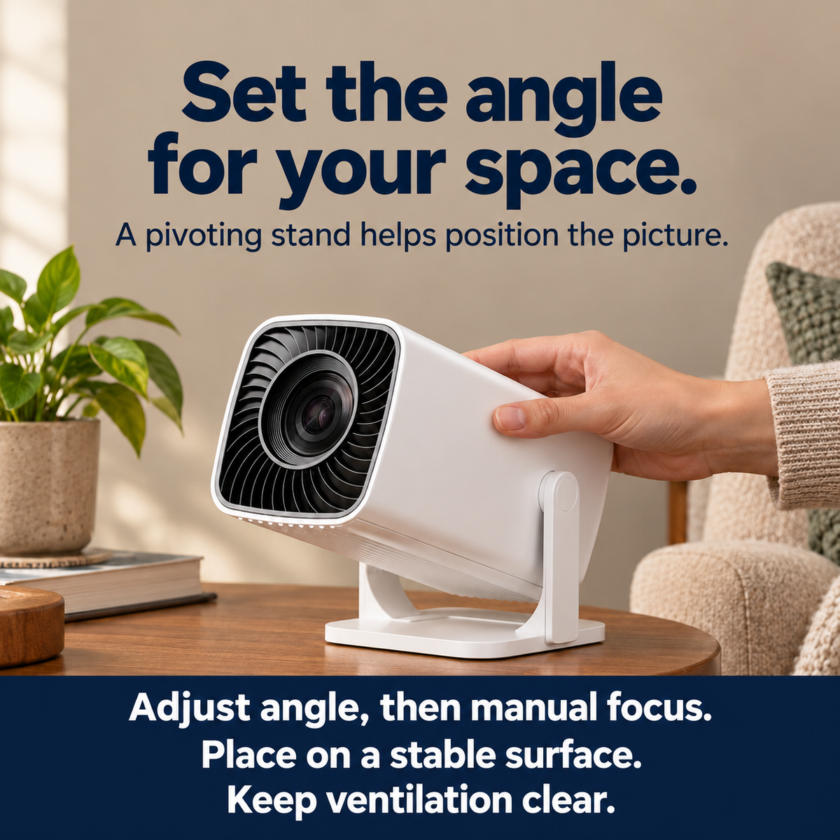A hand adjusts the projector on its tilting stand.