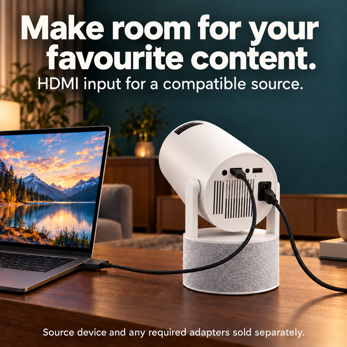 Rear view of the projector connected to a compatible laptop by HDMI and to mains power.