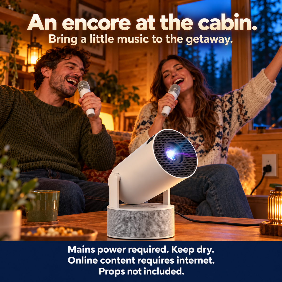 Two adults sing with the included microphones in a sheltered cabin.