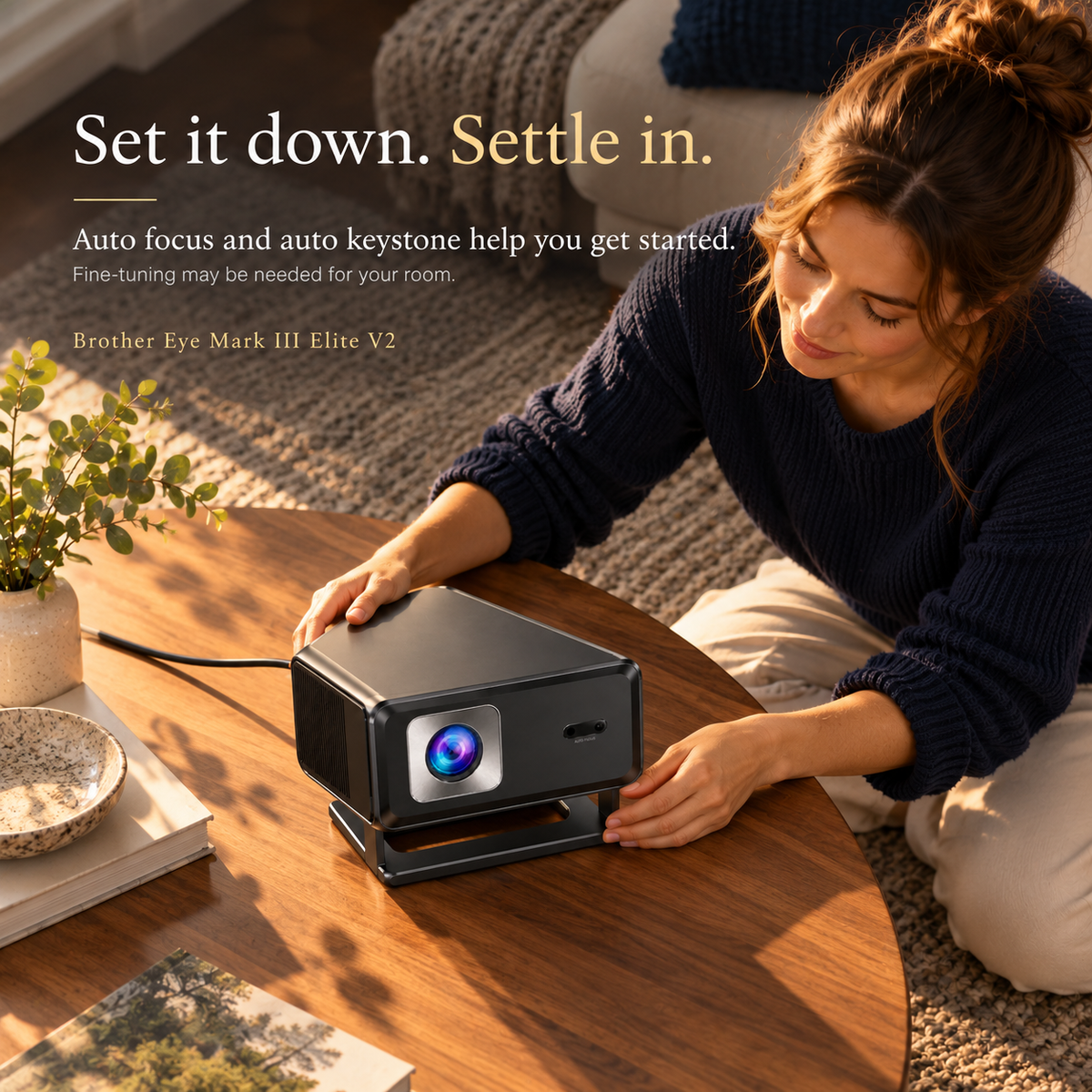 Overhead view of a person positioning the Brother Eye Mark III Elite V2; auto focus and keystone